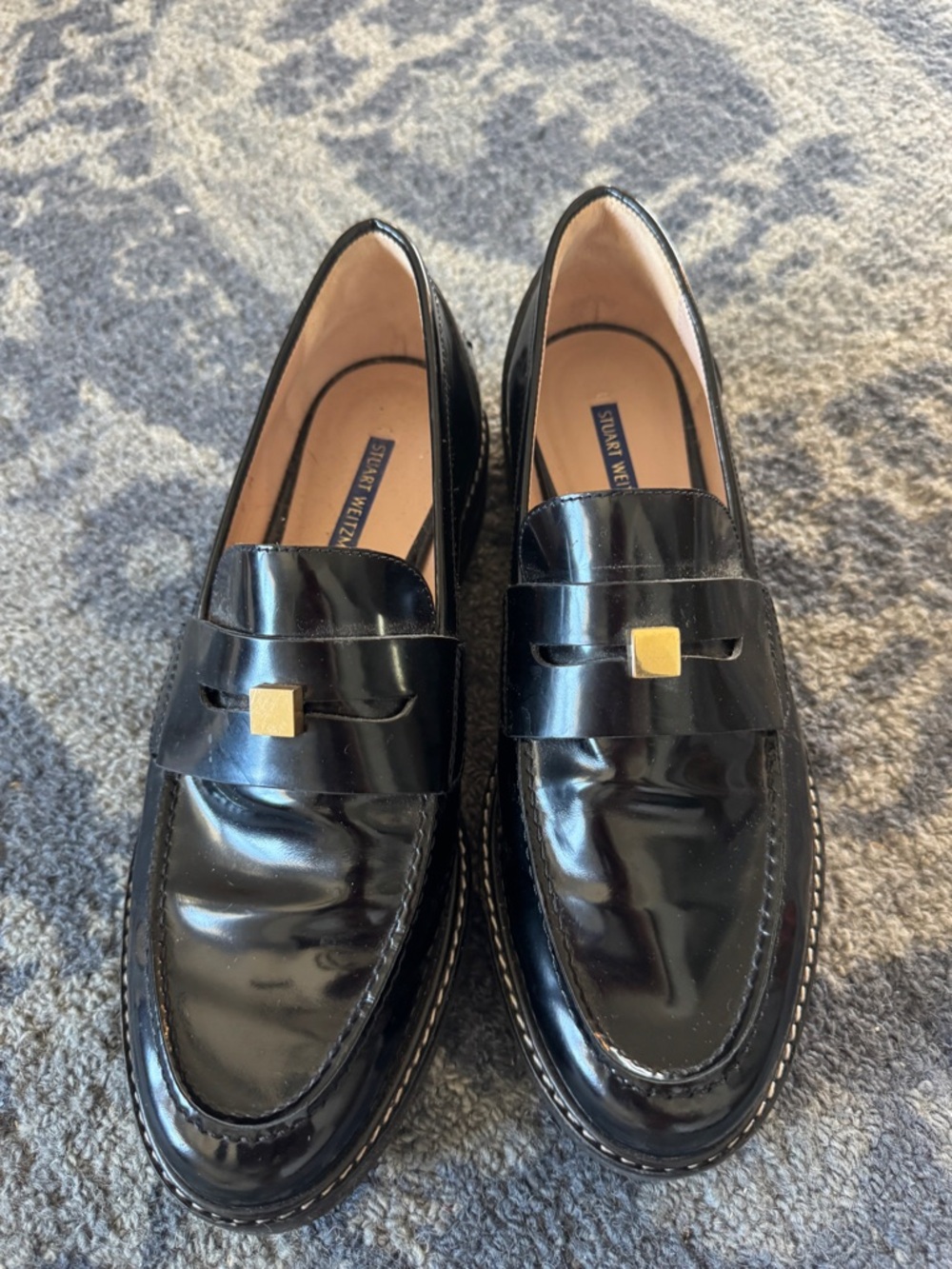 Stuart Weitzman Black Patent Leather Penny Loafers with Gold Square Accent